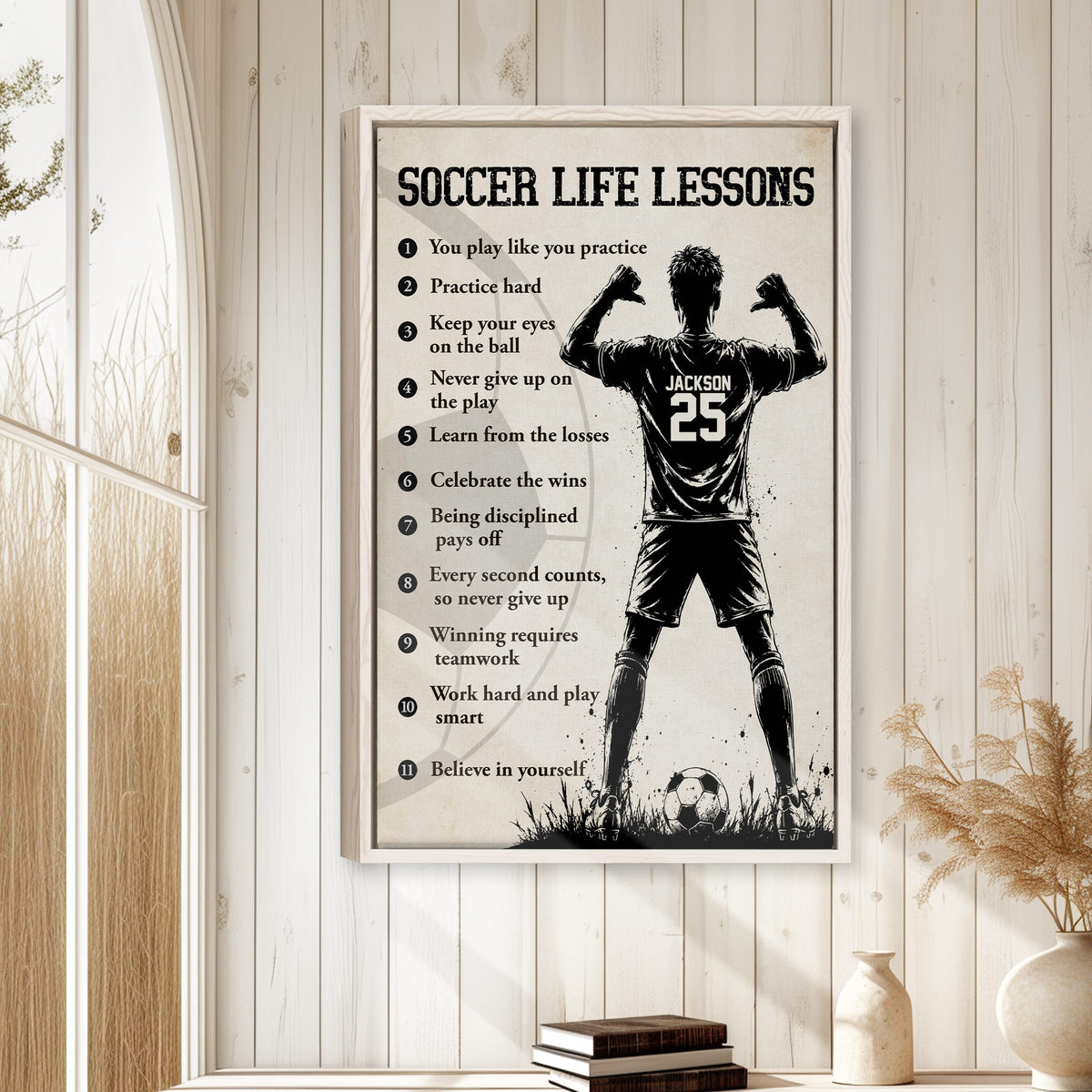 Soccer life lessons wall art displayed in a bright home with white wood walls and neutral decor
