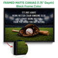 Black framed baseball canvas wall art with a glove, bat, ball, and stadium background