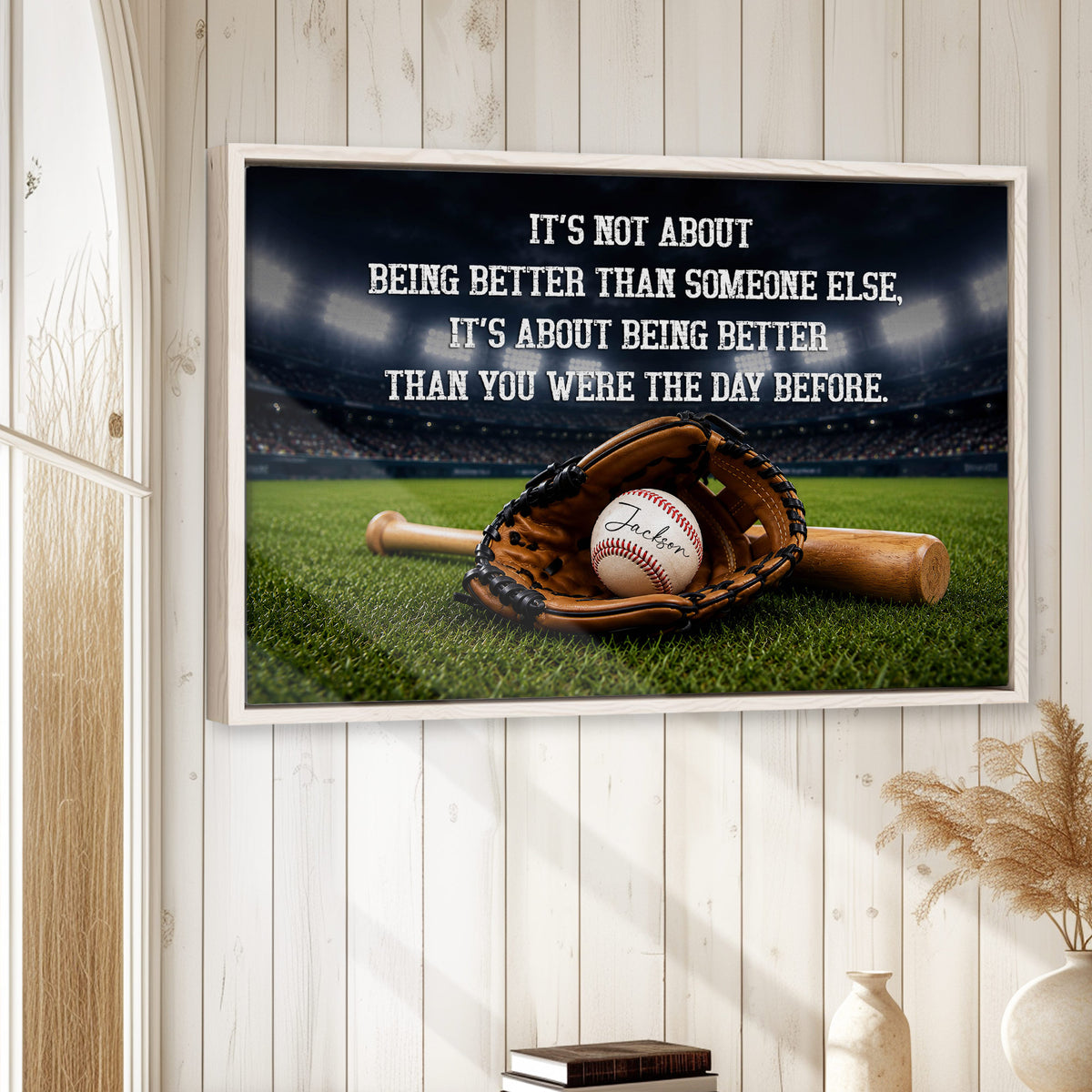 Framed baseball wall art displayed on a light wood paneled wall in a home setting