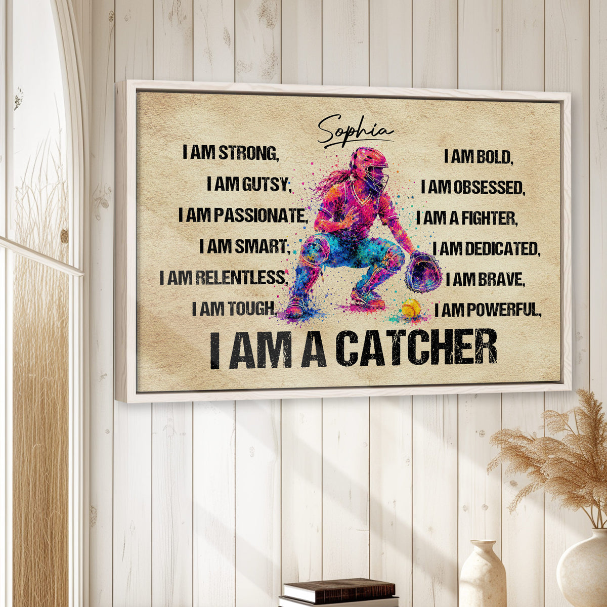 Softball catcher wall art displayed in a bright room with white wood walls and natural decor