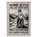 Framed motocross wall art showing a helmeted dirt bike rider on a mountain trail