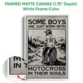 White framed canvas featuring a black and white motocross rider and rugged outdoor scenery
