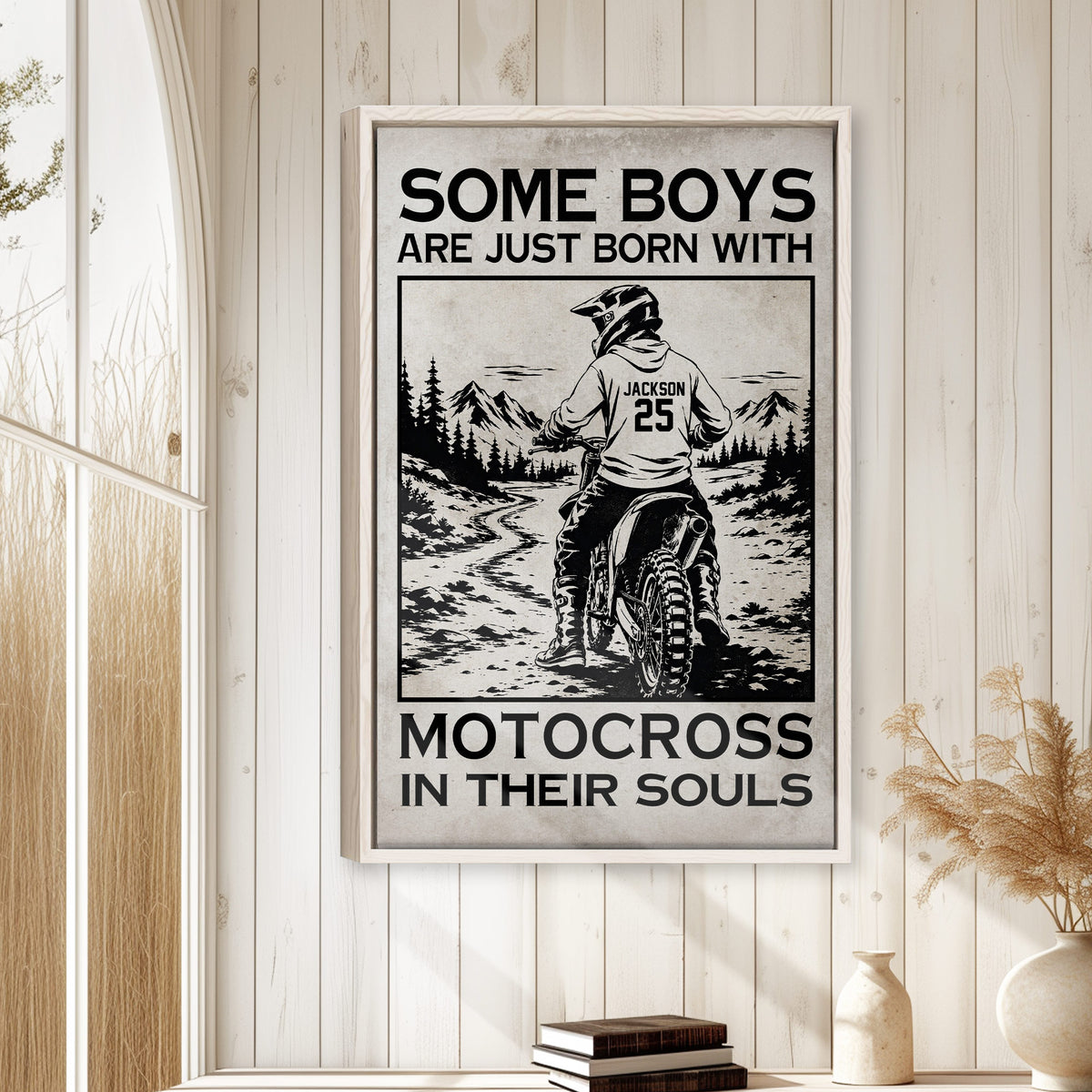 Motocross wall art displayed in a bright rustic room with white wood paneling