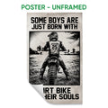 Unframed motocross poster featuring a helmeted dirt bike rider viewed from behind on a rugged outdoor trail