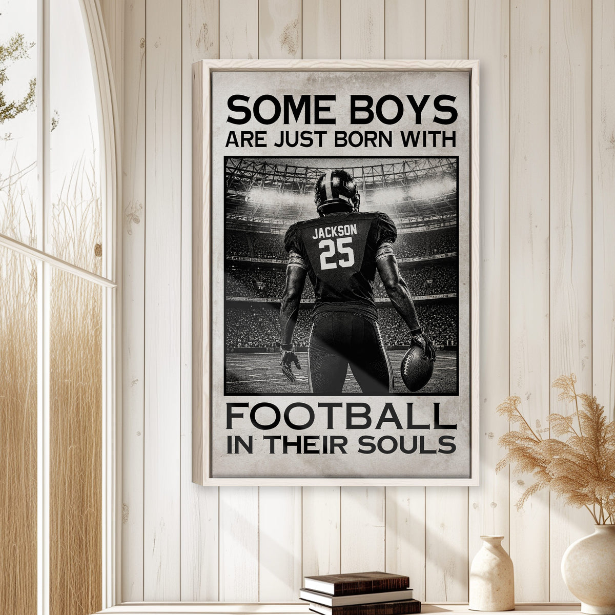Football wall art displayed in a bright home interior with white wood paneling and neutral decor