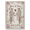 Motocross couple wall art with two dirt bike riders holding hands, floral border, teamwork quote and romantic rustic design