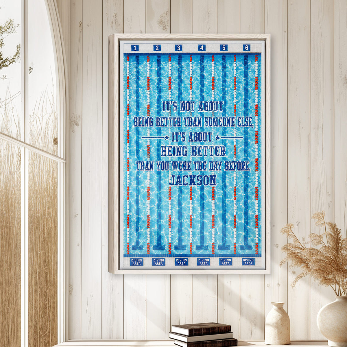 Swimming wall art displayed in a bright home with white paneling and neutral decorative accents
