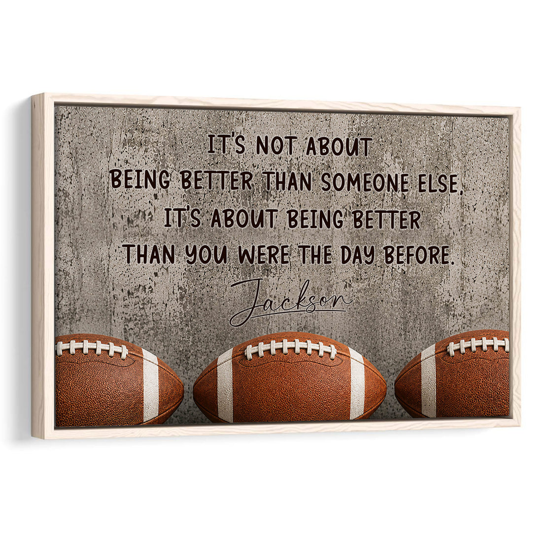 Framed football wall art with three footballs, a motivational message, and a textured gray background