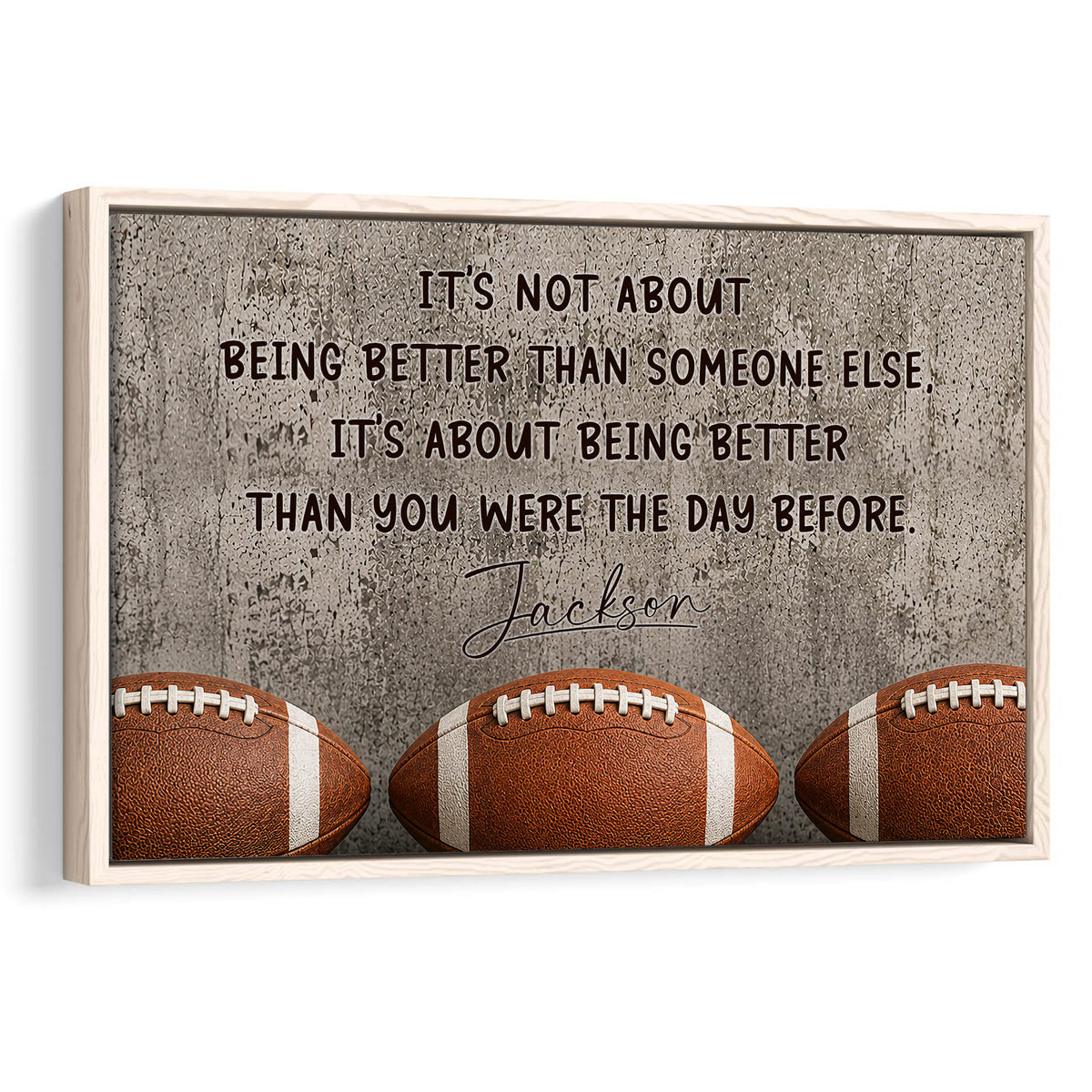 Framed football wall art with three footballs, a motivational message, and a textured gray background