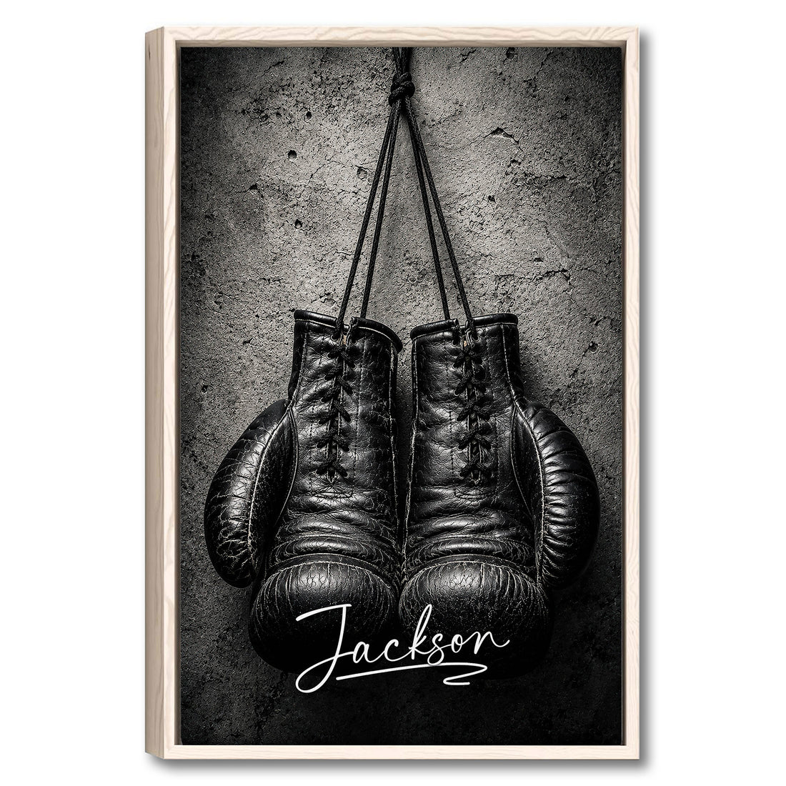 Framed boxing wall art featuring black gloves against a textured gray background