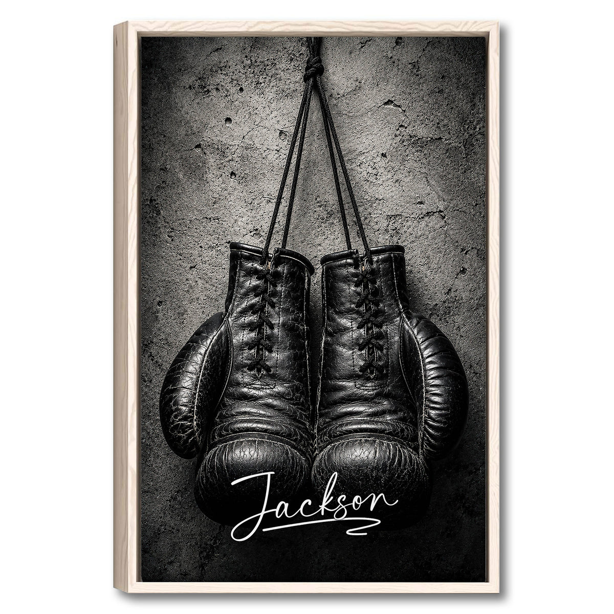 Framed boxing wall art featuring black gloves against a textured gray background