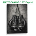 Matte canvas boxing wall art featuring black gloves and a textured gray background