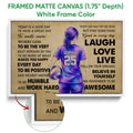 White framed volleyball canvas wall art with a purple player, volleyball, and close-up frame detail