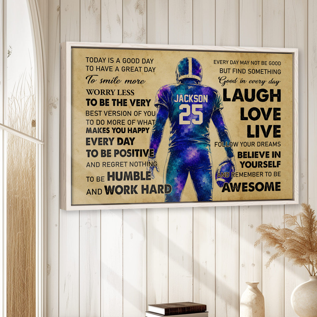 Framed football wall art displayed on a light wood-paneled wall in a bright room