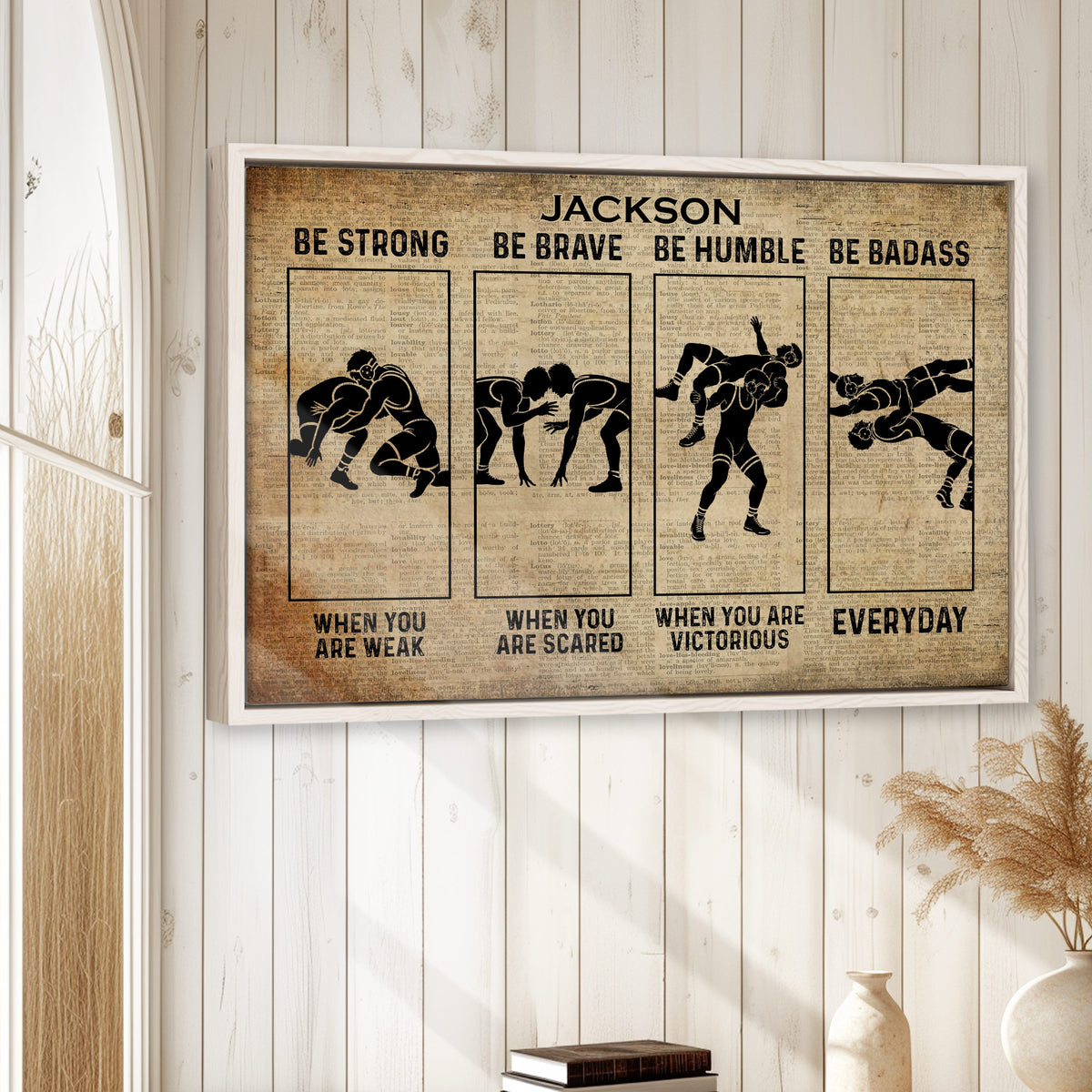 Wrestling wall art displayed in a bright room with white wood-paneled walls and neutral decor