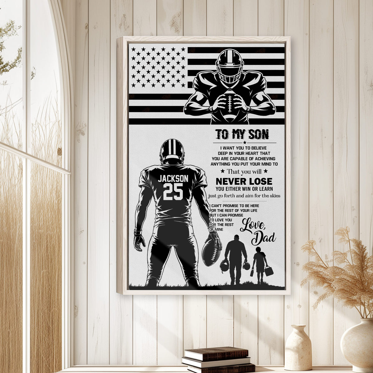 Framed football wall art displayed on a light wood wall in a bright home interior