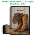 Black framed cowboy canvas wall art with a western hat and leather boots