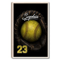 Framed softball wall art featuring a bright yellow softball in a dark glove on a black background