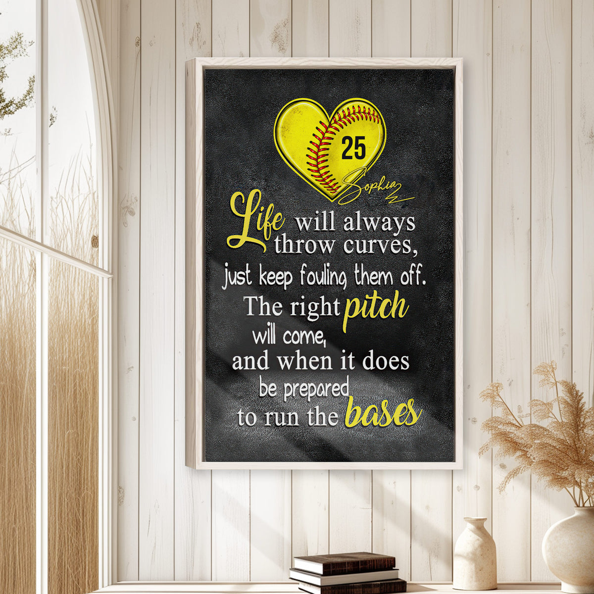 Softball wall art displayed in a bright room with white wood paneling and neutral home decor