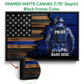 Black framed police canvas wall art featuring a blue-toned officer and distressed American flag design