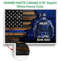 White framed police canvas wall art featuring a blue-toned officer and distressed American flag design
