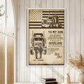 Framed trucker wall art displayed on a light wood-paneled wall in a warm home interior