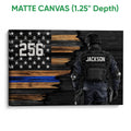 Matte canvas police wall art with a tactical officer and blue line flag on a dark wood-inspired background