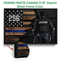 Black framed police canvas showing a tactical officer and distressed blue line American flag design