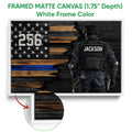 White framed police canvas featuring a tactical officer and blue line American flag artwork