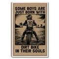 Framed motocross wall art featuring a dirt bike rider on a track with bold sepia typography