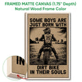 Framed motocross canvas wall art shown with a natural wood frame in a rustic style