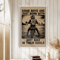 Motocross wall art displayed in a bright room with white wood paneling and natural decor