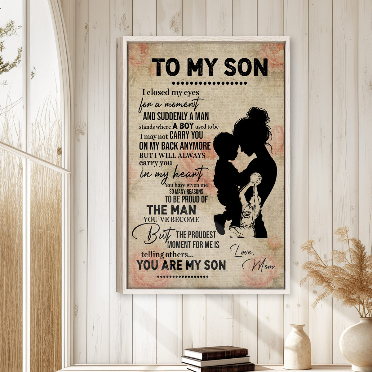 Basketball mother and son wall art displayed on a light wood-paneled wall in a warm home setting