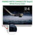 Framed hockey canvas wall art in a white frame with an edge detail view