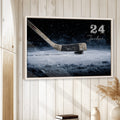 Hockey wall art displayed in a light wood framed room with white paneled walls
