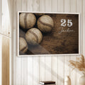 Baseball wall art displayed in a bright room with white wood paneling