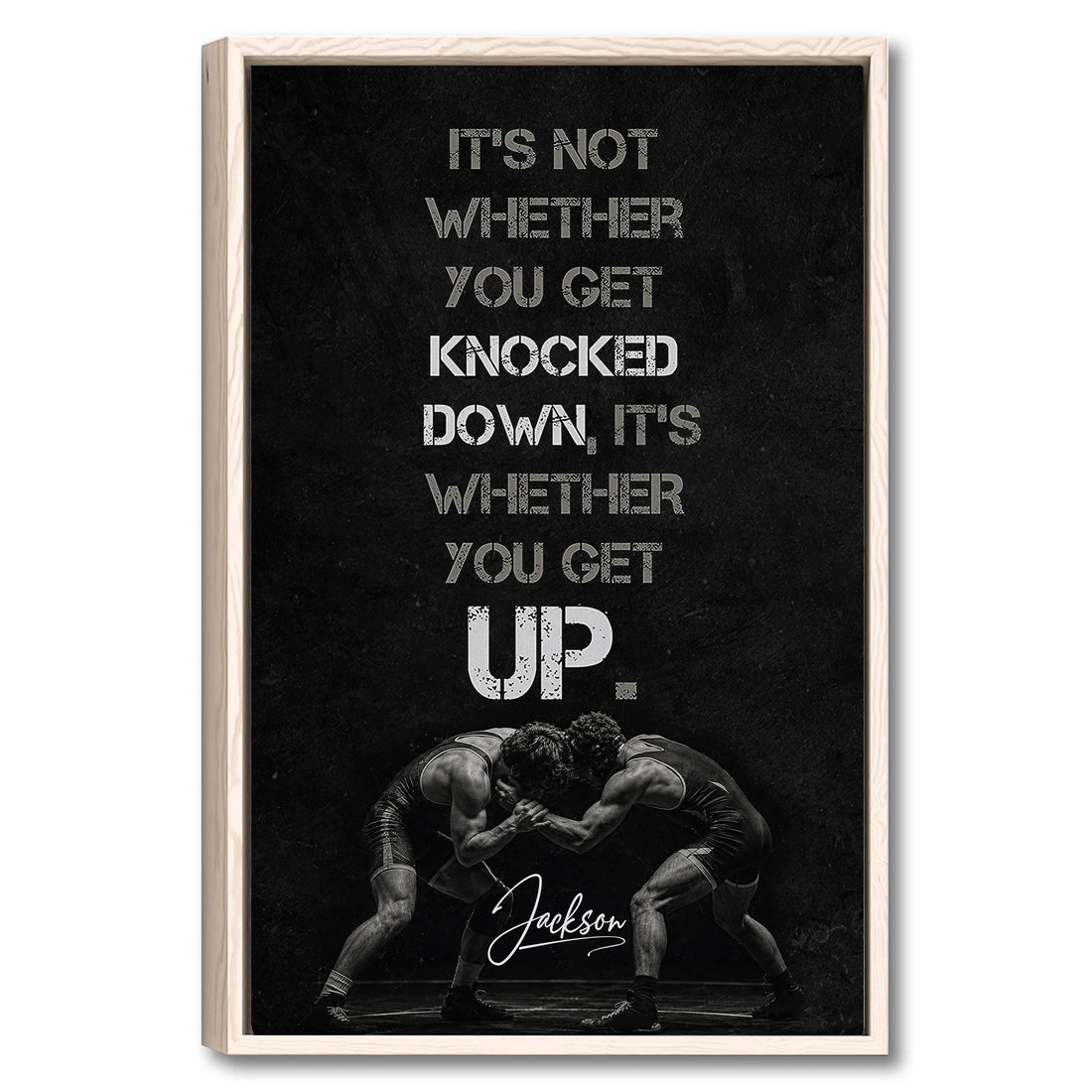 Framed wrestling wall art with two wrestlers grappling beneath a bold motivational design