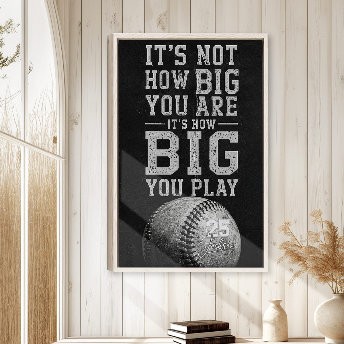 Baseball wall art displayed in a bright room with white wood paneling and natural wood decor