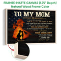 Natural wood framed firefighter wall art with glowing orange silhouette imagery and a mother and child tribute