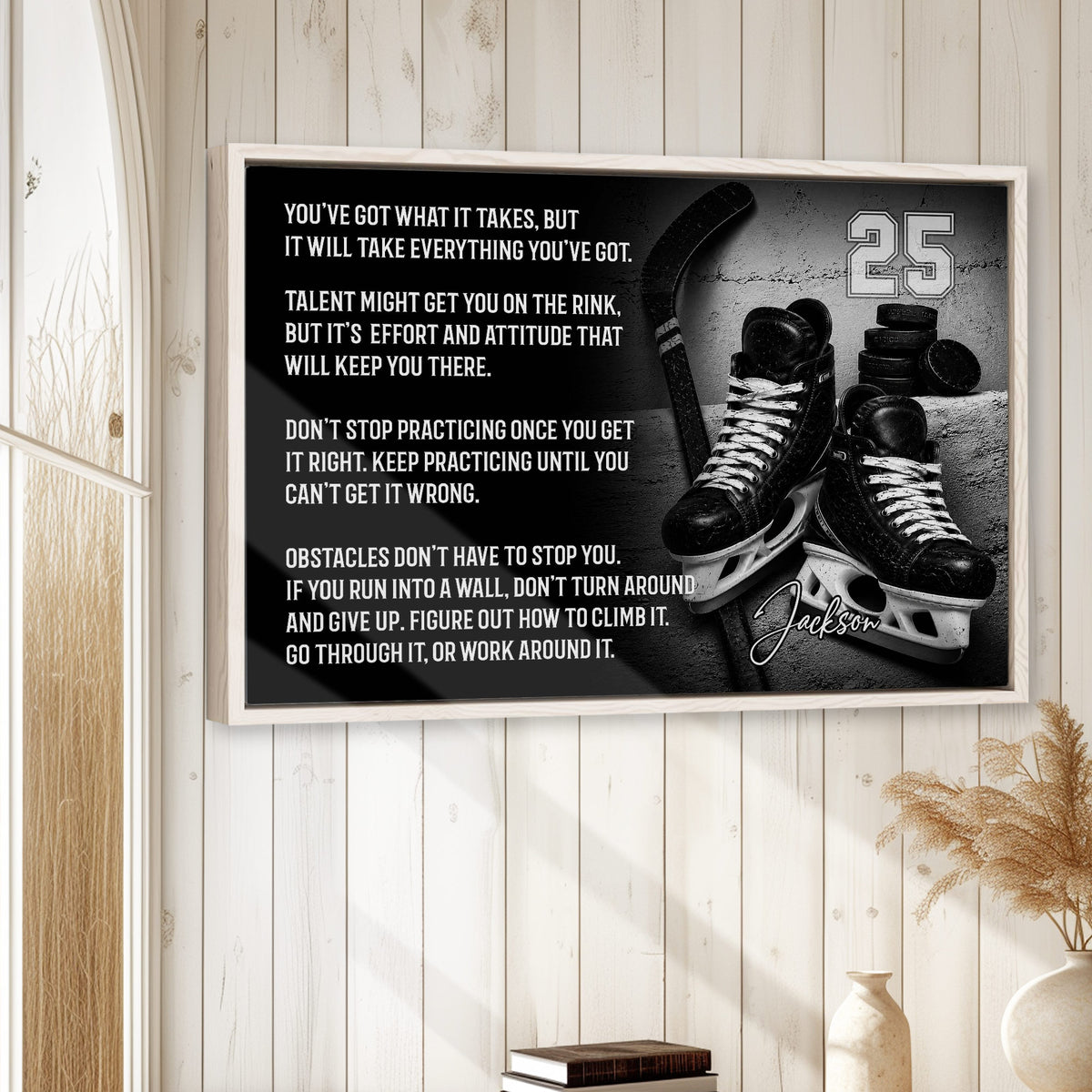Framed hockey wall art displayed on a light wood-paneled wall in a neutral home interior