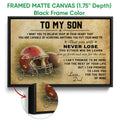 Black framed canvas football wall art showing a red helmet and inspirational typography