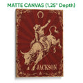 Matte canvas wall art featuring a cowboy bull rider against a distressed red Western background