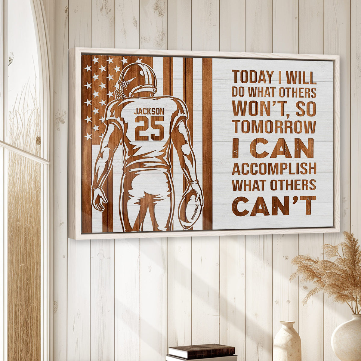 Football wall art displayed on a light wood-paneled wall in a bright, rustic-inspired room