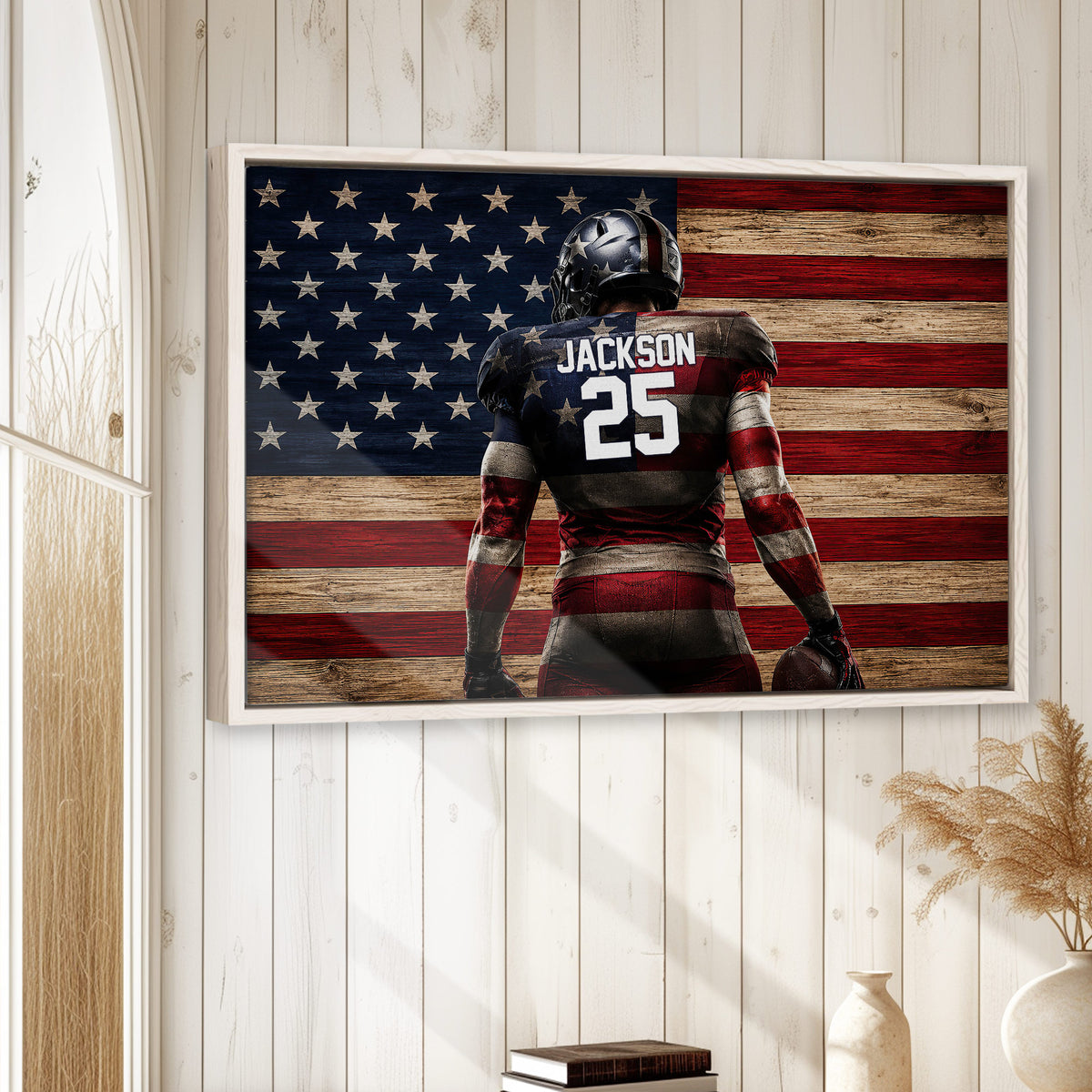 Patriotic football wall art displayed on a light wood-paneled wall in a bright home interior