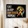 Colorful softball wall art displayed in a bright room with white wood paneling