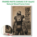 Framed matte canvas football wall art shown with a natural wood frame and detailed edge view
