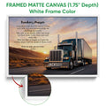 White framed canvas wall art featuring a semi-truck driving across a scenic sunset highway