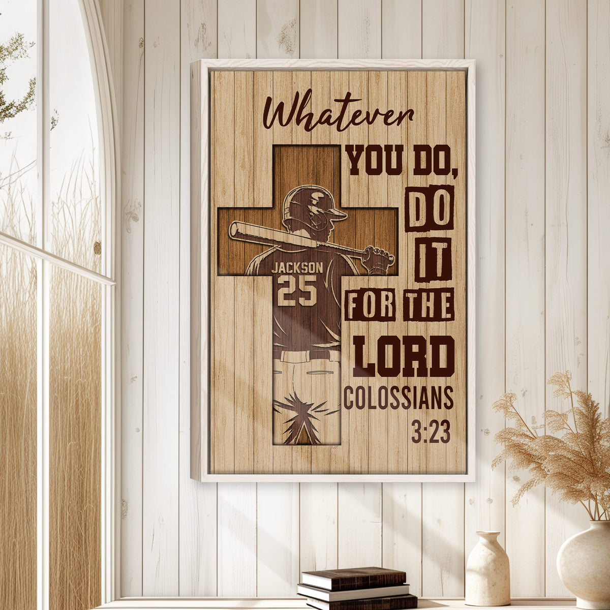 Framed baseball wall art displayed on a light wood-paneled wall in a warm home decor setting