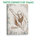 Matte canvas swimming wall art with a floral border and female swimmer illustration