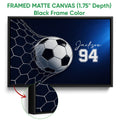 Black framed soccer canvas wall art with a ball and goal net design in navy blue and white